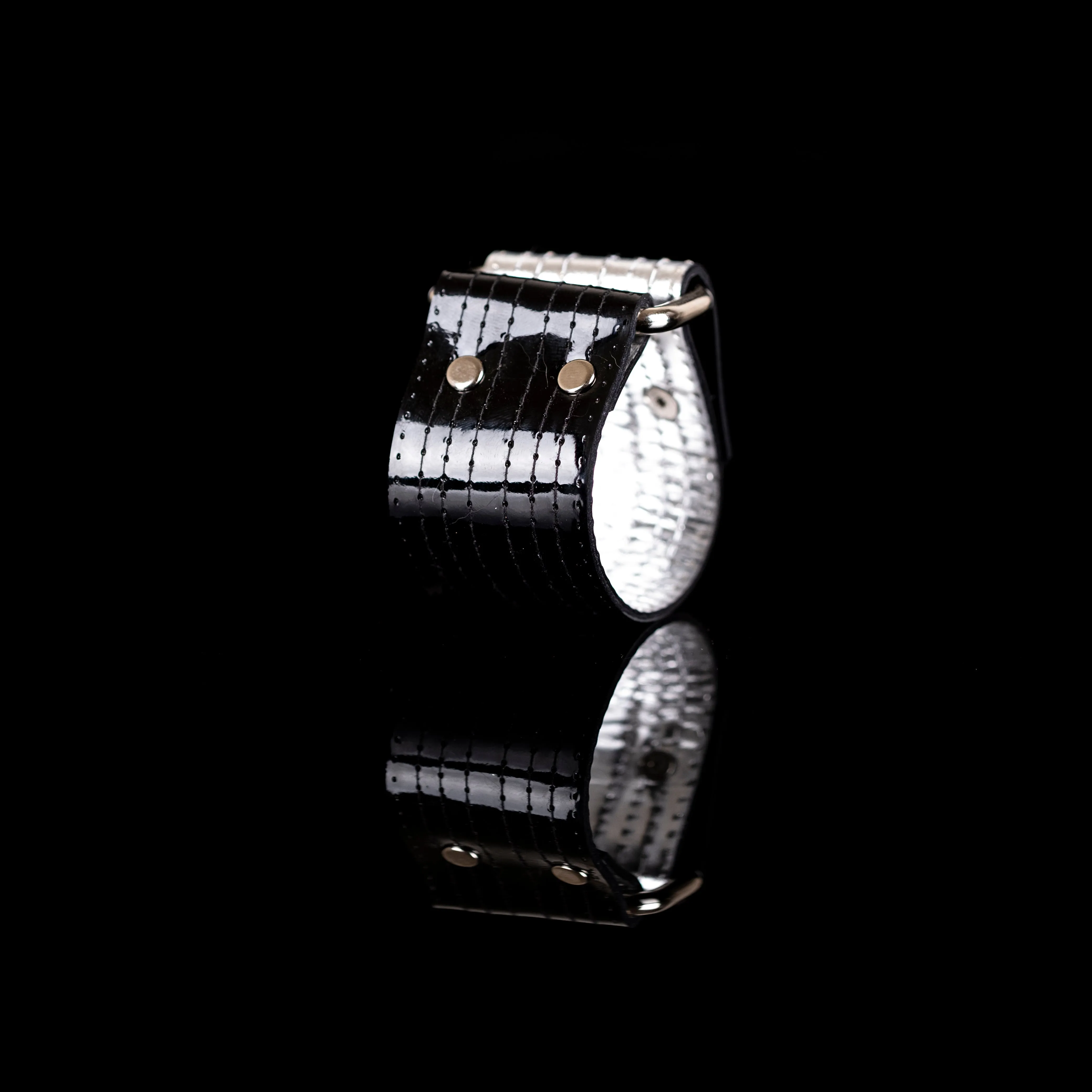 The Perforated Black and Silver Leather Cuff